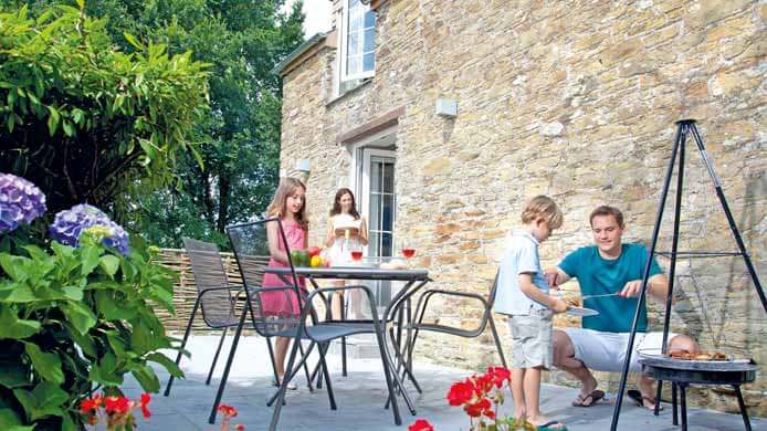 Family enjoying a cottage holiday